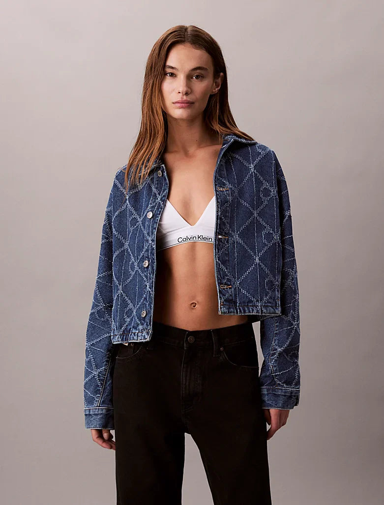 Veste en jean entièrement imprimée de logos