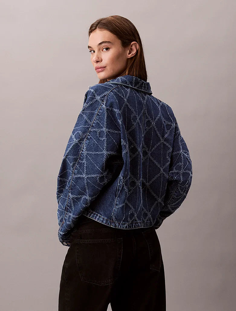 Veste en jean entièrement imprimée de logos
